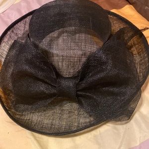Black hat with big bow on the front